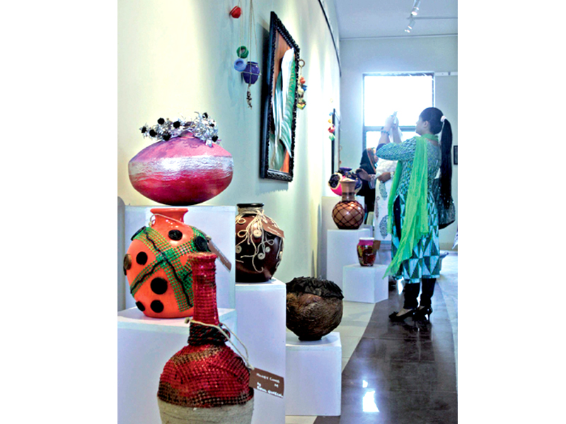 crafts exhibition creativity recycled painted pots with sprinkle on top