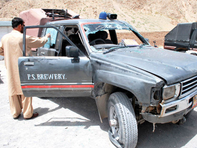 under fire two police officials slain in ambush