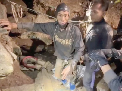 rescuers free four more trapped in laos cave rescuers free four more trapped in laos cave