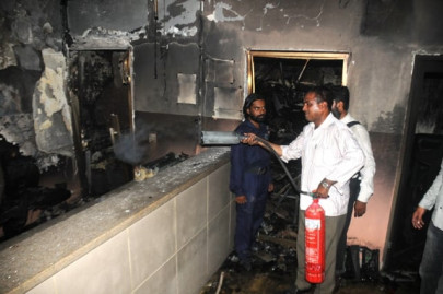 turning up the heat kesc office burns as power outages continue