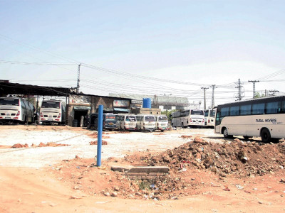 obliging passengers despite ban bus terminal sprouts in faizabad obliging passengers despite ban bus terminal sprouts in faizabad