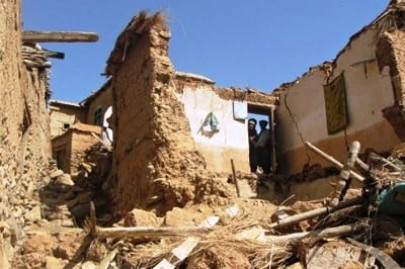 more than 50 feared dead in afghan quakes
