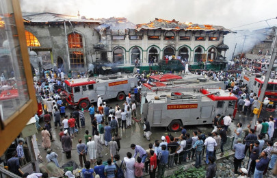 blaze at sufi shrine triggers violence in indian kashmir