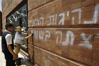 arrests made in israeli holocaust memorial vandalism