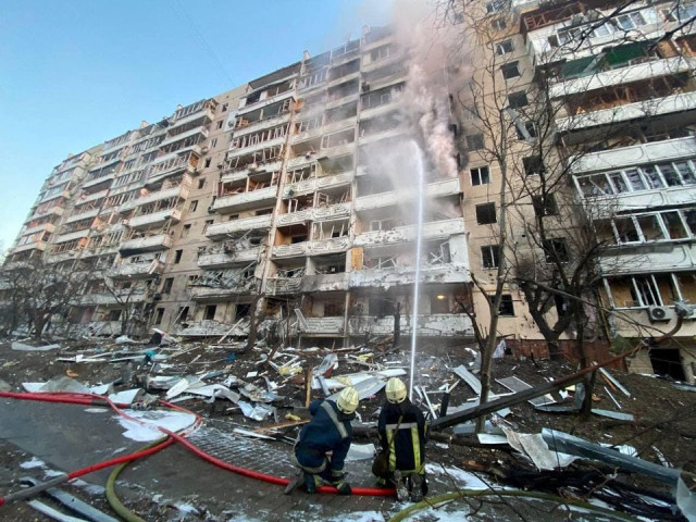 rescuers work next to a residential building damaged by shelling as russia s attack on ukraine continues in kyiv ukraine in this handout picture released march 15 2022 photo reuters rescuers work next to a residential building damaged by shelling as russia s attack on ukraine continues in kyiv ukraine in this handout picture released march 15 2022 photo reuters