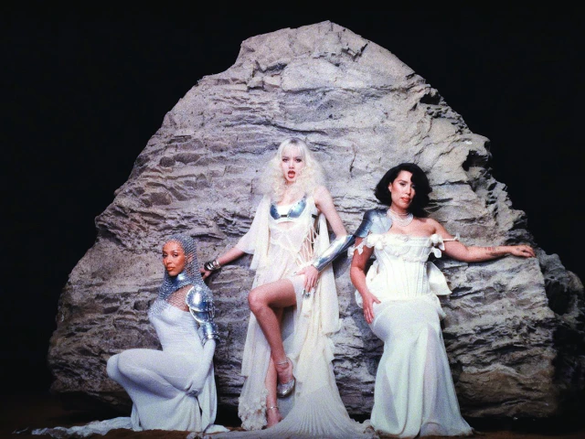 the three artists undergo a transformation in the music video photo file the three artists undergo a transformation in the music video photo file