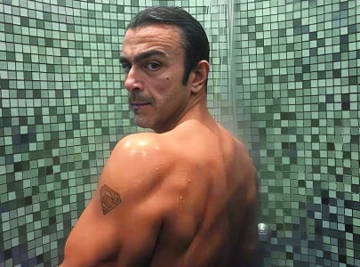 shaan defends shirtless photos