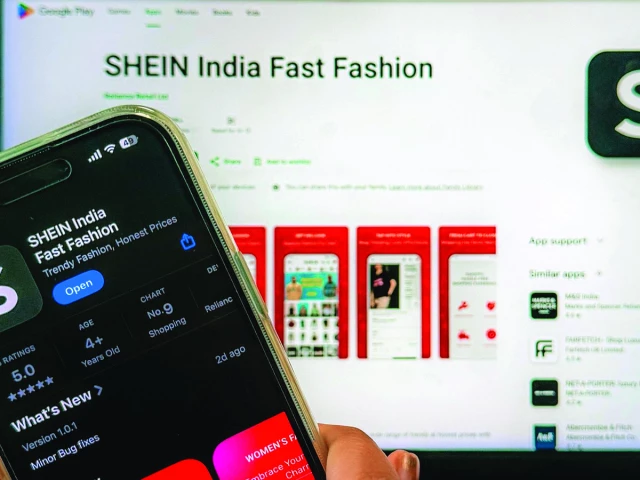shein offers low priced western clothes photo file shein offers low priced western clothes photo file