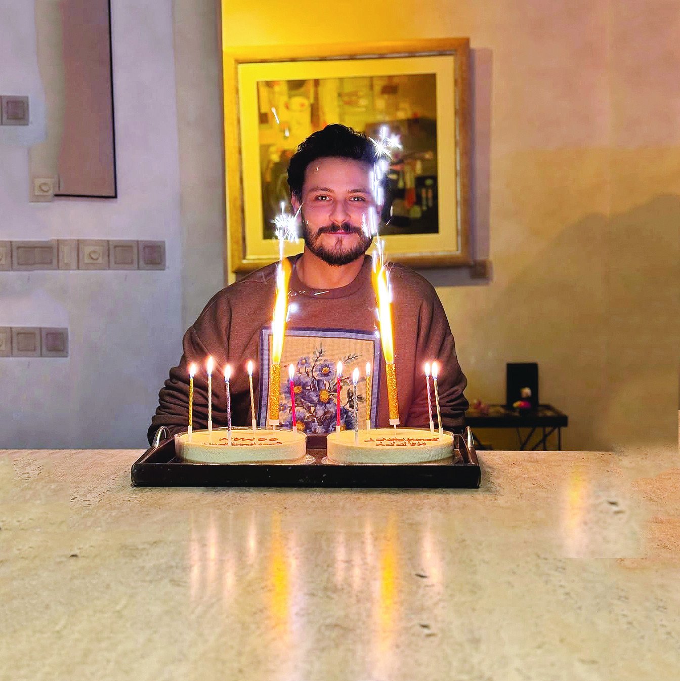 osman posed with two cakes photo instagram