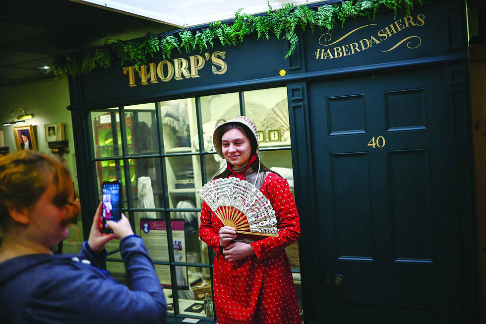 people are expected to don costumes in bath photo file