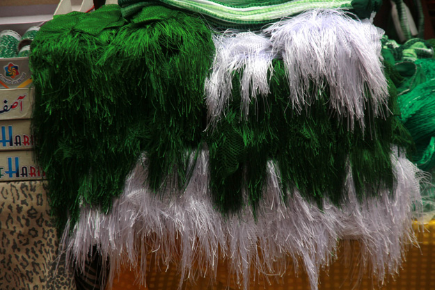 Stalls displayed with green and white pompoms for 14 August celebrations. PHOTO: ATHAR KHAN/EXPRESS