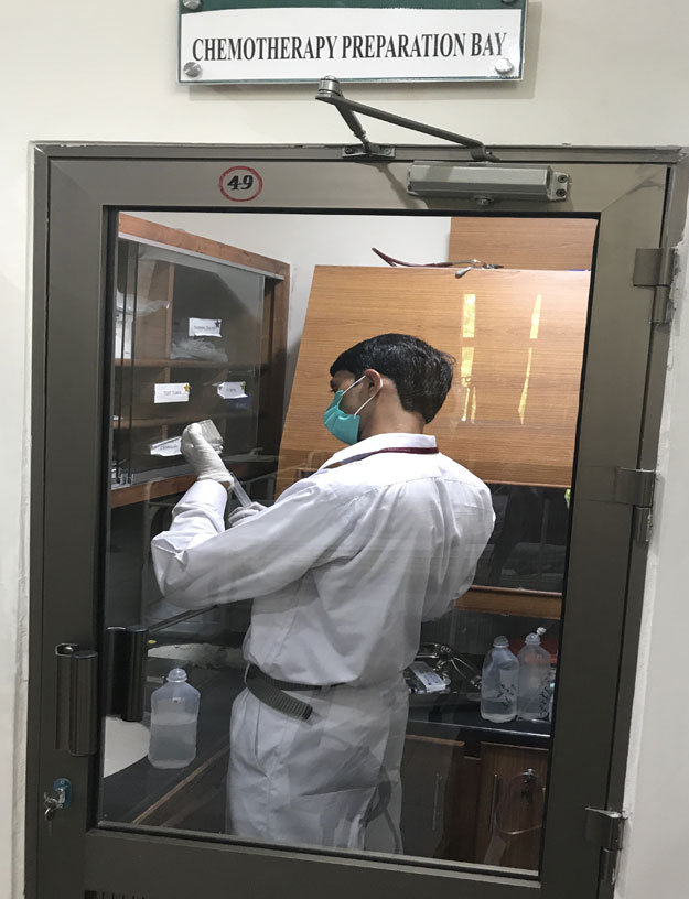 A nurse preparing chemotherapy medication. PHOTO: RAJA KHALID SHABBIR