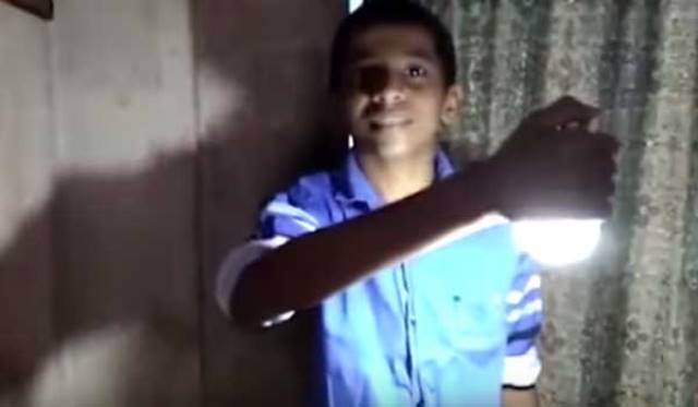 indian boy claims to light led bulbs with his bare skin