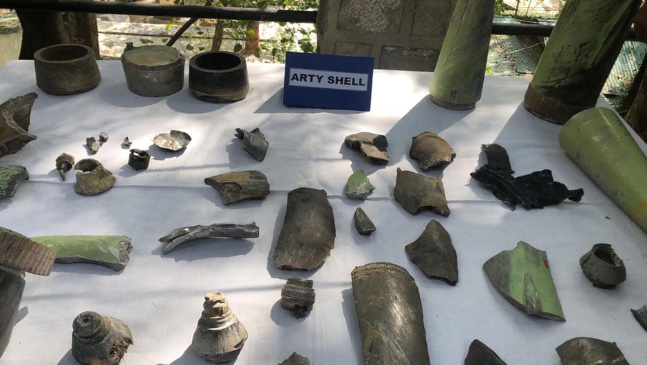 The diplomats and accompanying media personnel are shown remnants of the shells fired by Indian forces. PHOTO: EXPRESS 