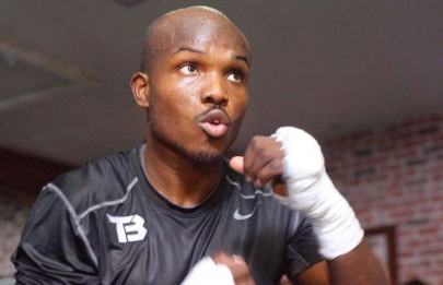boxing bradley keeps welterweight title