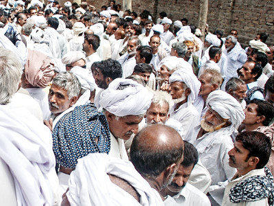 watan cards flood affected people protest suspension of registration