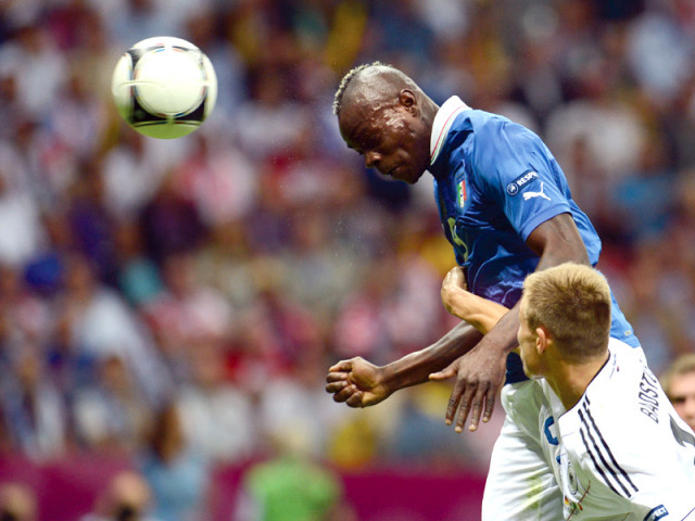 fabregas wary of blossoming balotelli