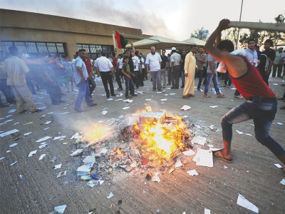 benghazi attack protesters ransack election office in libyan city