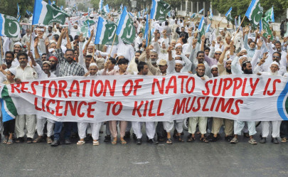 ji supporters protest against nato supply resumption