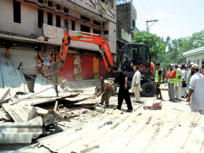 government crackdown food stalls shops razed in anti encroachment drive government crackdown food stalls shops razed in anti encroachment drive