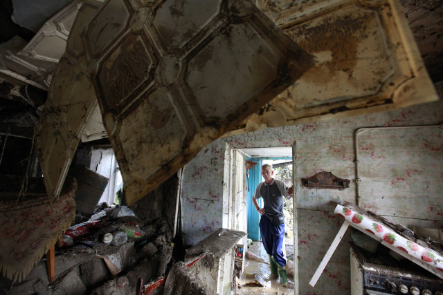 death toll in southern russian floods climbs to 141 police death toll in southern russian floods climbs to 141 police