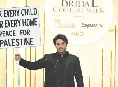 peace for palestine ahsan khan makes a statement of solidarity at fashion showcase peace for palestine ahsan khan makes a statement of solidarity at fashion showcase