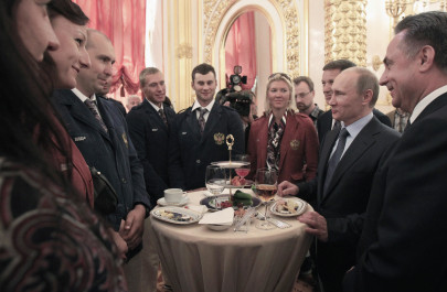 olympics putin gives russians kremlin send off