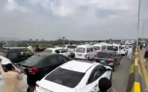 pti s asad alleges airport blockade amid g b poll row
