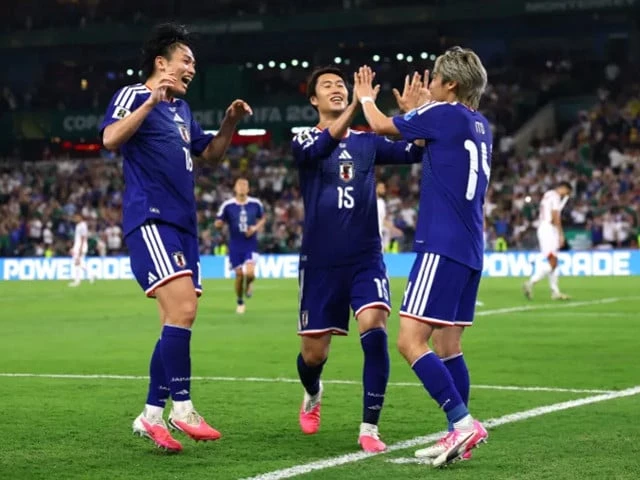 japan thrashed tunisia to move joint top of group f photo afp file japan thrashed tunisia to move joint top of group f photo afp file
