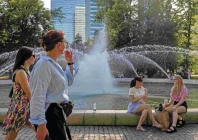 residents of warsaw cool off near a fountain in the city centre during the heatwave that has reached poland photo afp