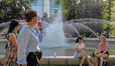 residents of warsaw cool off near a fountain in the city centre during the heatwave that has reached poland photo afp