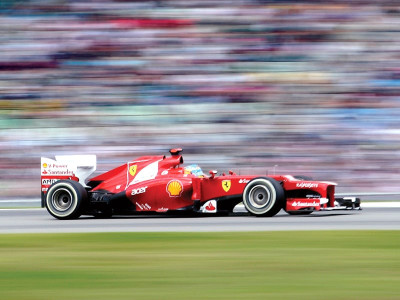 f1 alonso wins controversial german gp