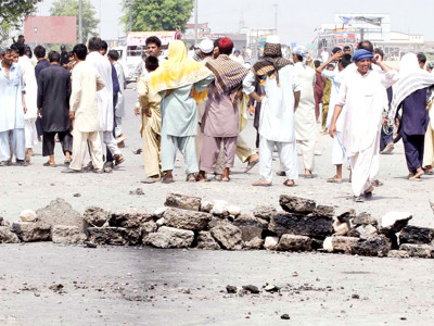 power crisis protesters block two main highways ransack offices