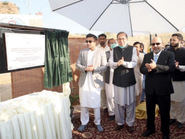 special assistant to the prime minister on overseas pakistanis syed zulfi bukhari unveils the plaque for the plot handing over ceremony at the opf housing scheme photo express special assistant to the prime minister on overseas pakistanis syed zulfi bukhari unveils the plaque for the plot handing over ceremony at the opf housing scheme photo express
