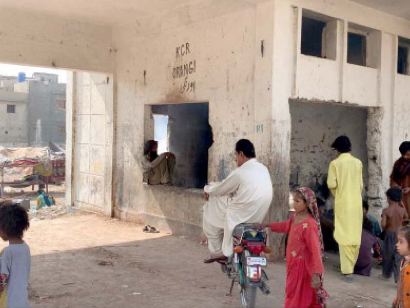 orangi station s ticket house is deprived of any doors and windows with people loitering outside the platforms at the intra city railway station too are in dilapidated condition photo express