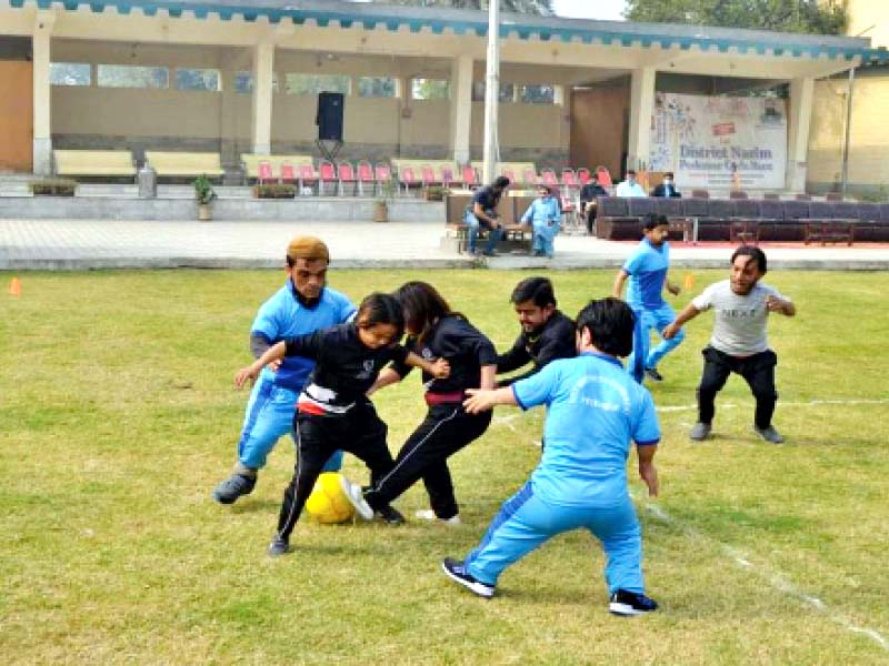 players try to outdo their rivals during last year s dwarf sports festival held in nowshera photo express