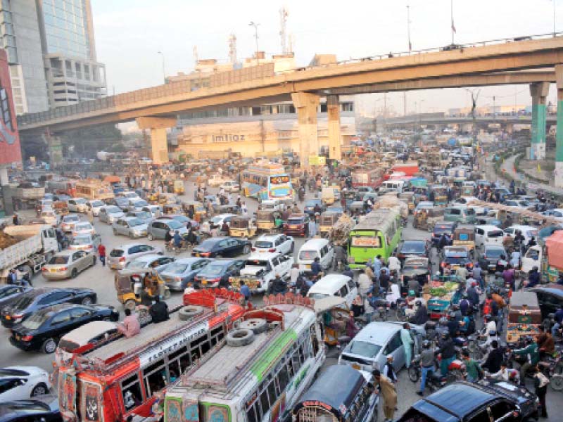 long queues of vehicles were witnessed around qayyumabad chowrangi on thursday following a clash between citizens and traffic policemen photo ppi