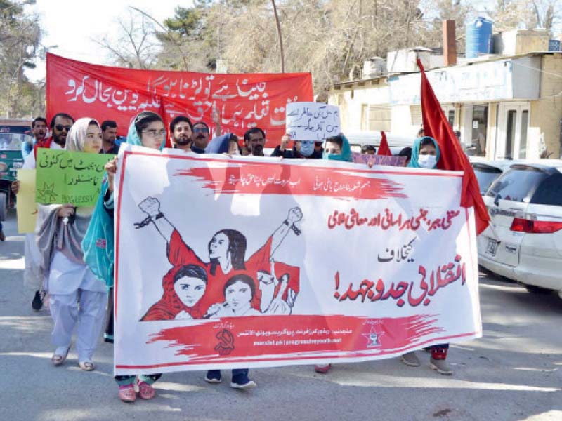 women and men stage a joint rally to mark the international women s day in quetta it was organised by red workers friend progressive youth alliance photo app