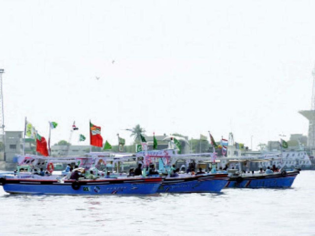 as part of pakistan day celebrations the pakistan coast guards organised a boat race and critical mass karachi held a cycle rally in karachi on tuesday photos jalal qureshi nni afp