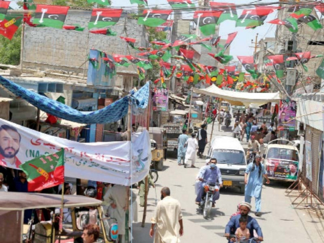the flags and banners of different political parties adorned the streets of na 249 in karachi photo ppi file the flags and banners of different political parties adorned the streets of na 249 in karachi photo ppi file