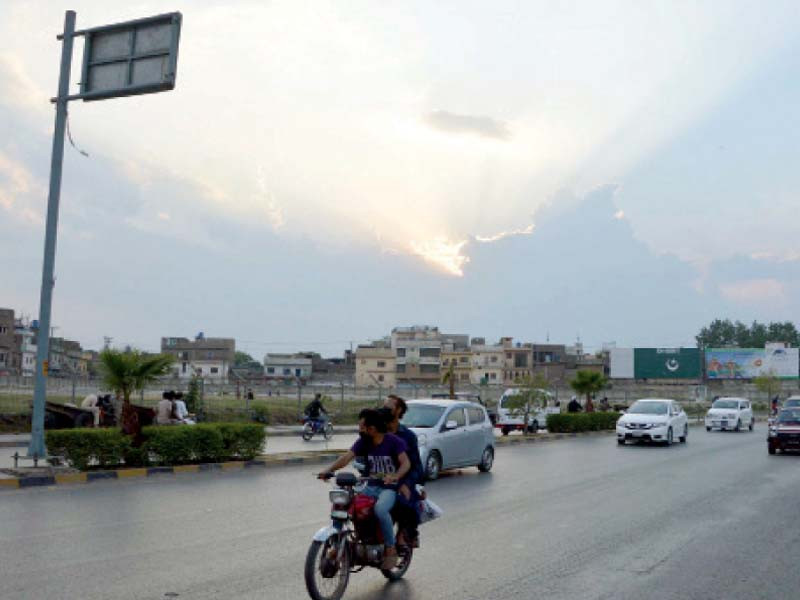 clouds take over the rawalpindi skyline as pleasant weather sets in ahead of eid photo ppi