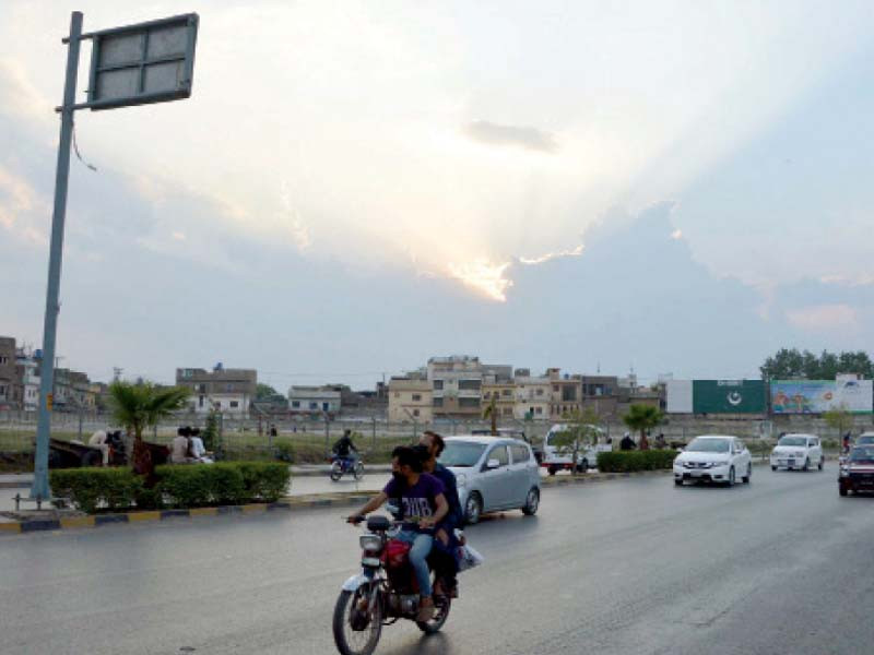 clouds take over the rawalpindi skyline as pleasant weather sets in ppi file