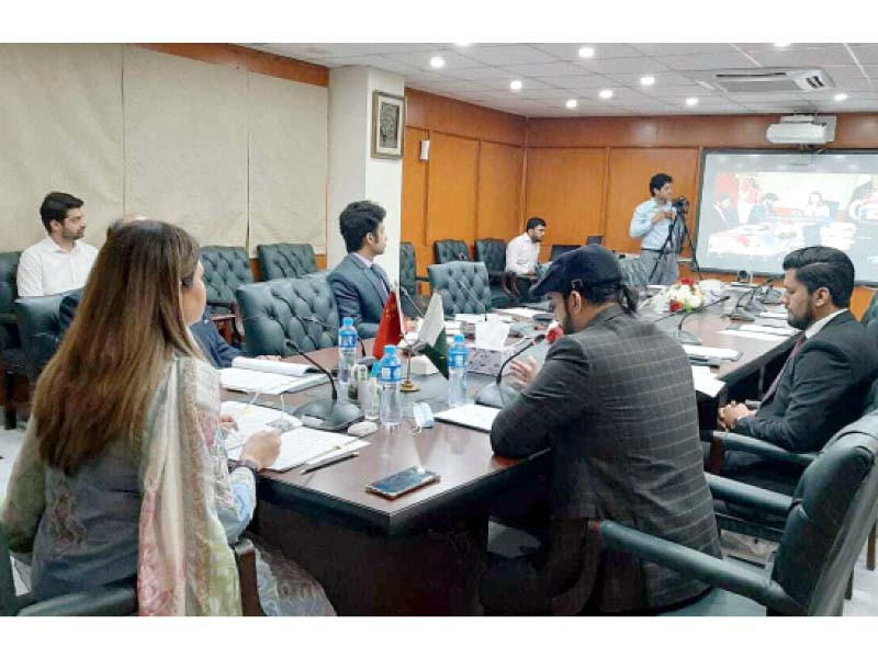 panelists at the islamabad office connect with experts in china via a video link photo file