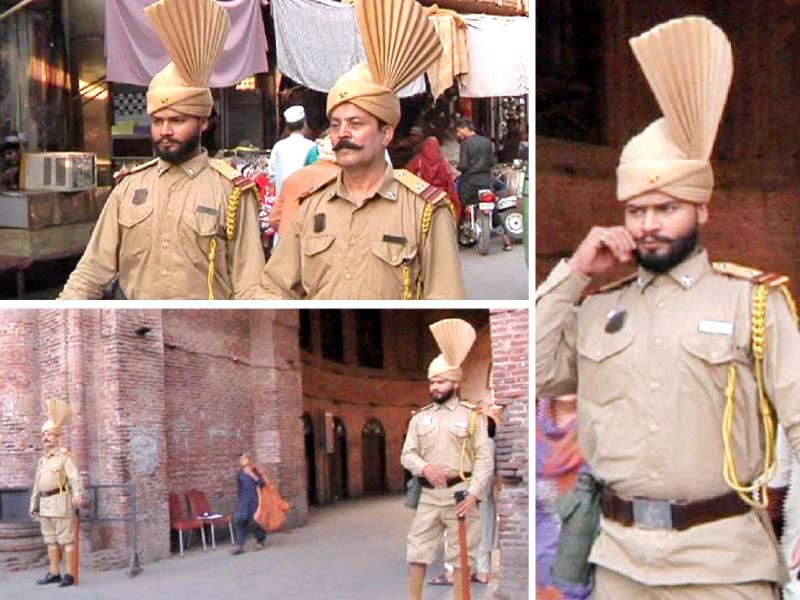 walled city of lahore authority wcla revives the mughal tradition as two kotwals have been deployed in a street of the old city dressed in their khaki uniform coupled with shorts and long socks both of them wear a sheriff like badge that says kotwal photos sadeem anwar express