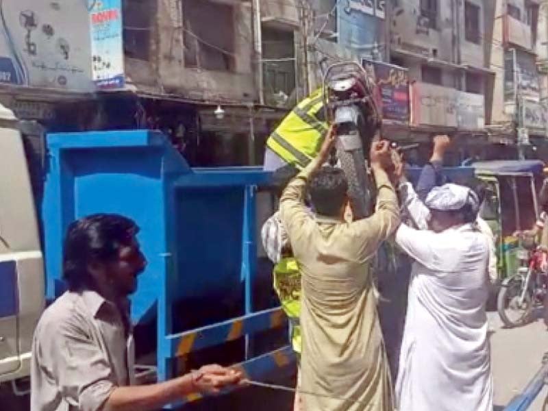 rmc workers remove encroachments during a grand operation at bara bazaar and other areas of rawalpindi photo ex press