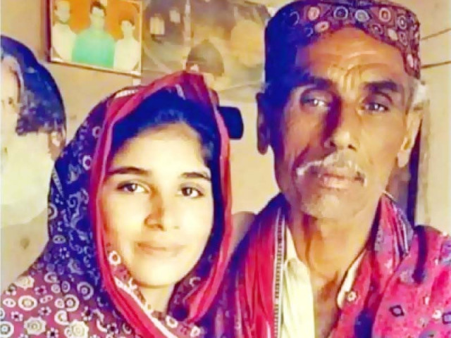sindhi writer comrade abdul mannan chandio with his daughter before his eyes were damaged photo express sindhi writer comrade abdul mannan chandio with his daughter before his eyes were damaged photo express