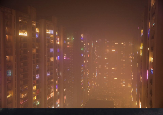 lights decorating the balconies of a high rise are seen shrouded in smog in noida india november 5 2021 reuters