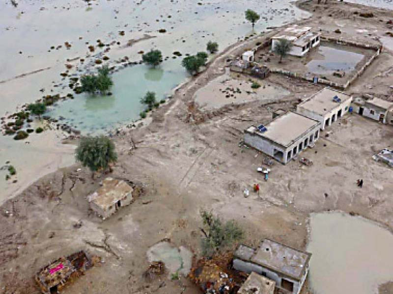 the aerial view of a village surrounded by floodwater in gwadar district balochsitan photo nni
