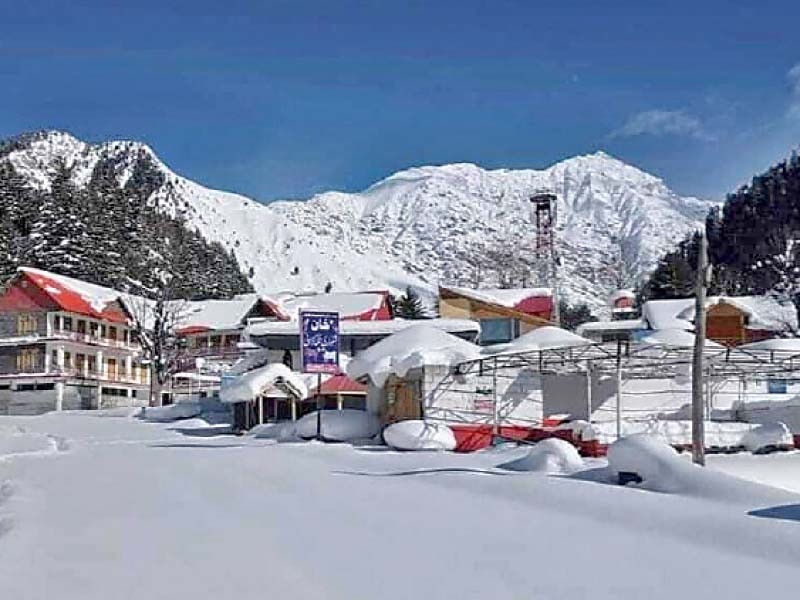 snow capped mountains and snow clad structures beckon tourists to kaghan valley photo express