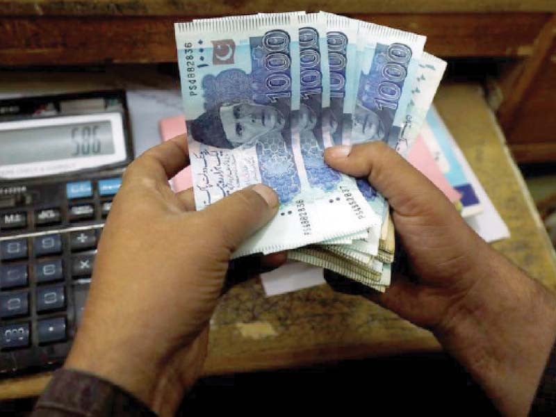 experts said that uncertain domestic political situation was mounting pressure on the rupee photo file